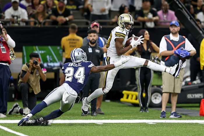 New Orleans Saints receiver Michael Thomas (13) makes a catch in front of Cowboys cornerback Chidobe Awuzie (24). Mandatory Credit: Chuck Cook-USA TODAY